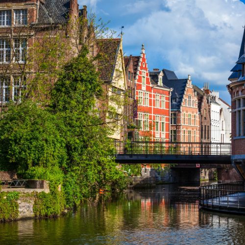 Travel Belgium medieval european city town background with canal. Ghent, Belgium
