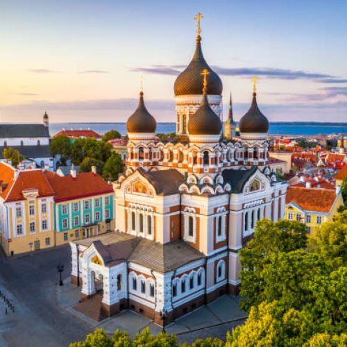 aerial view of Alexander Nevsky cathedral and St Mary's Cathedral at sunset in Tallinn, Estonia