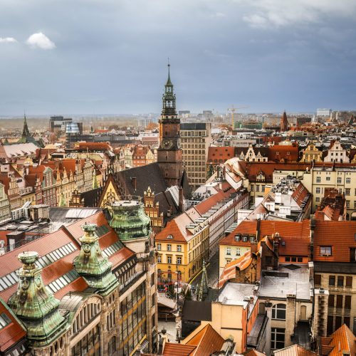 View from above on amazing architecture of Wroclaw city in Poland. Scenic old center part with colorful roofs and houses of Wroclaw.